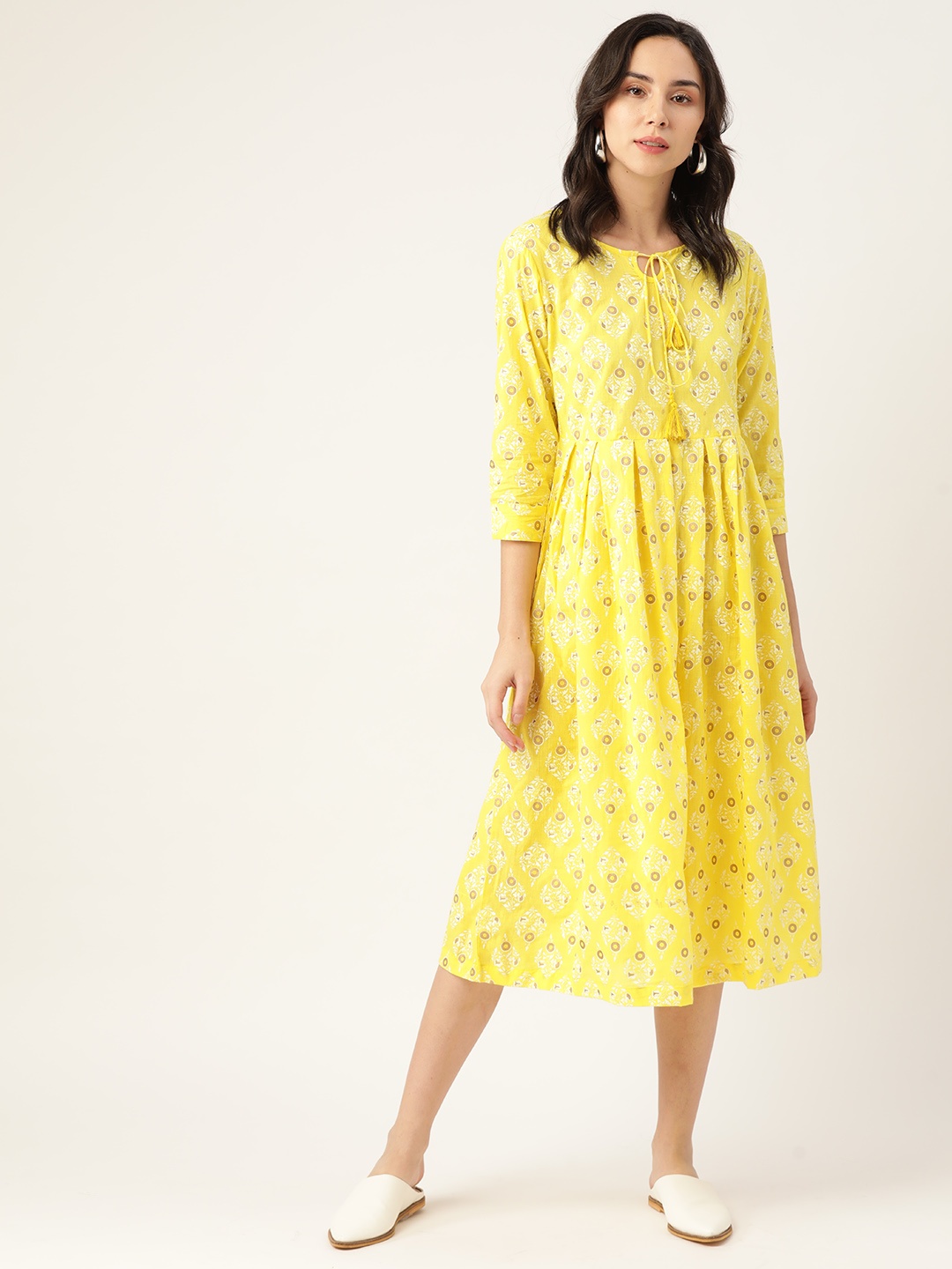 

Sangria Women Yellow Cotton Ethnic Motif Printed Tie-Up Neck Midi Dress