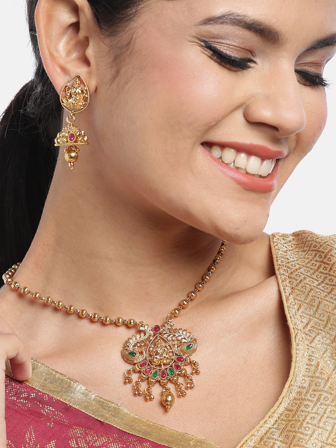 

JEWELS GEHNA Red Gold-Plated Stone-Studded Goddess Lakshmi Handcrafted Jewellery Set