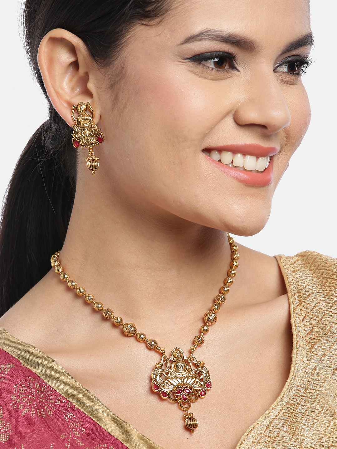 

JEWELS GEHNA Red Gold-Plated Stone-Studded Goddess Lakshmi Handcrafted Jewellery Set