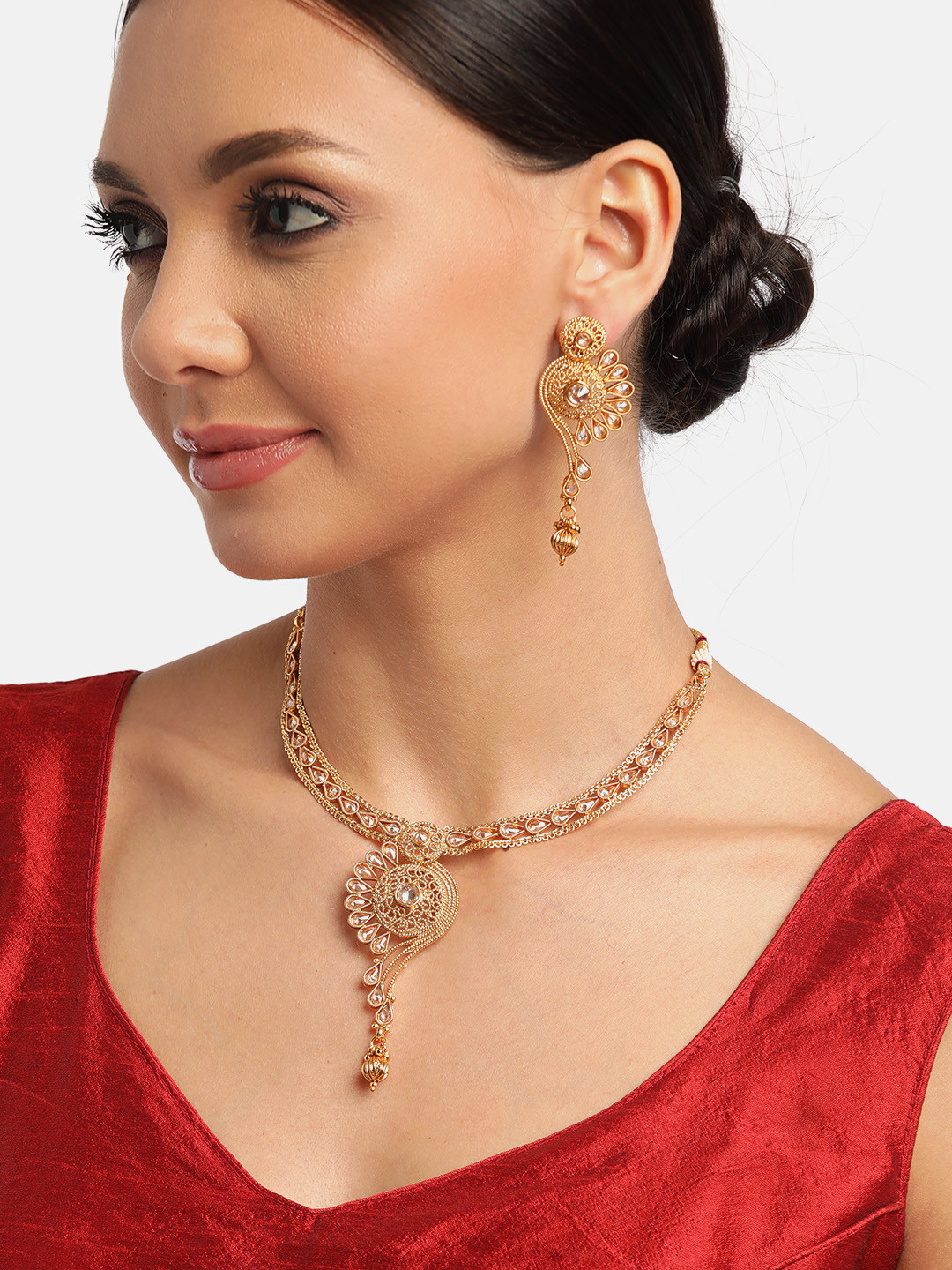 

JEWELS GEHNA Women Gold-Plated Stone Studded Handcrafted Jewellery Set