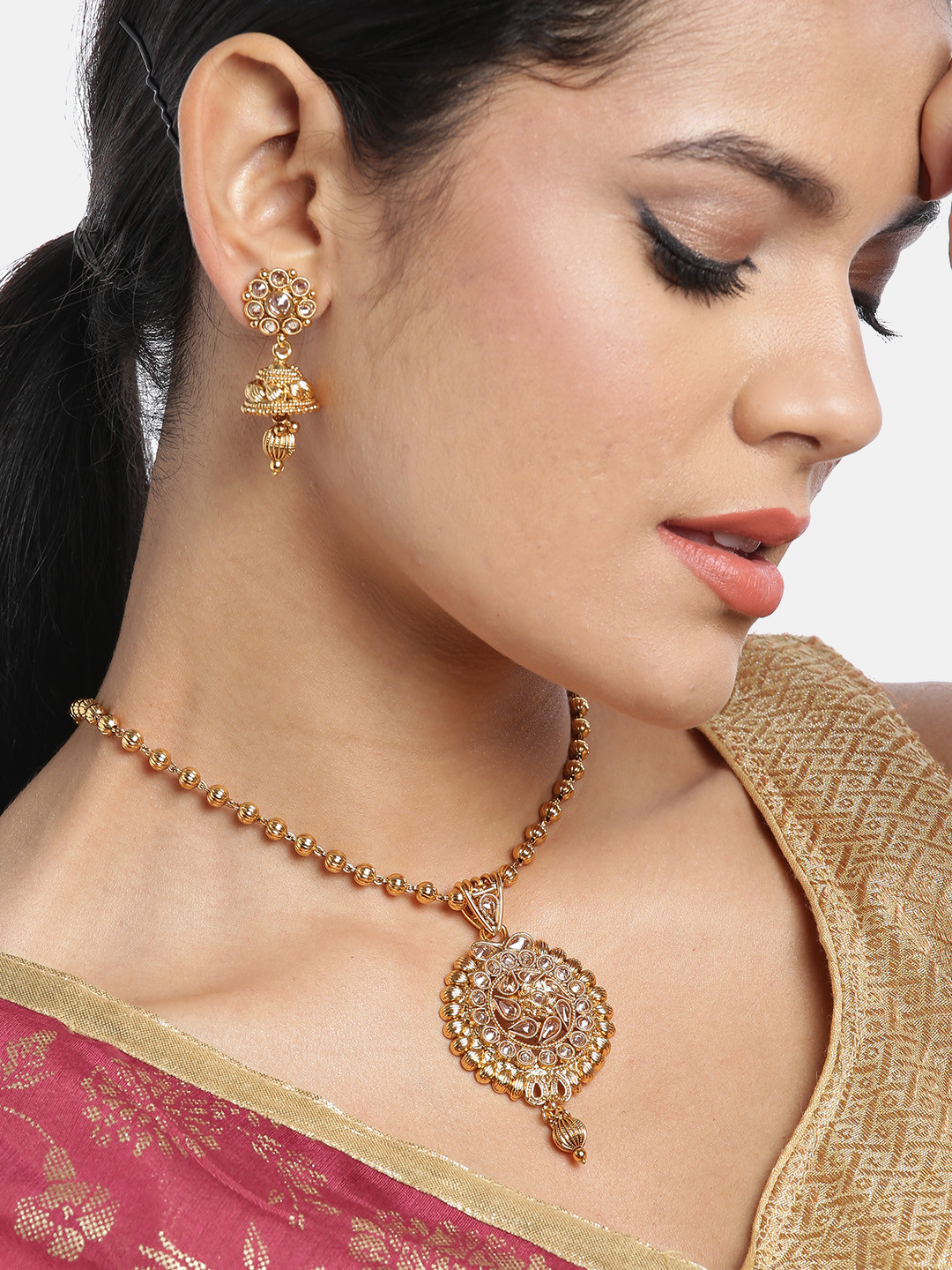 

JEWELS GEHNA Gold-Plated Stone Studded Handcrafted Jewellery Set