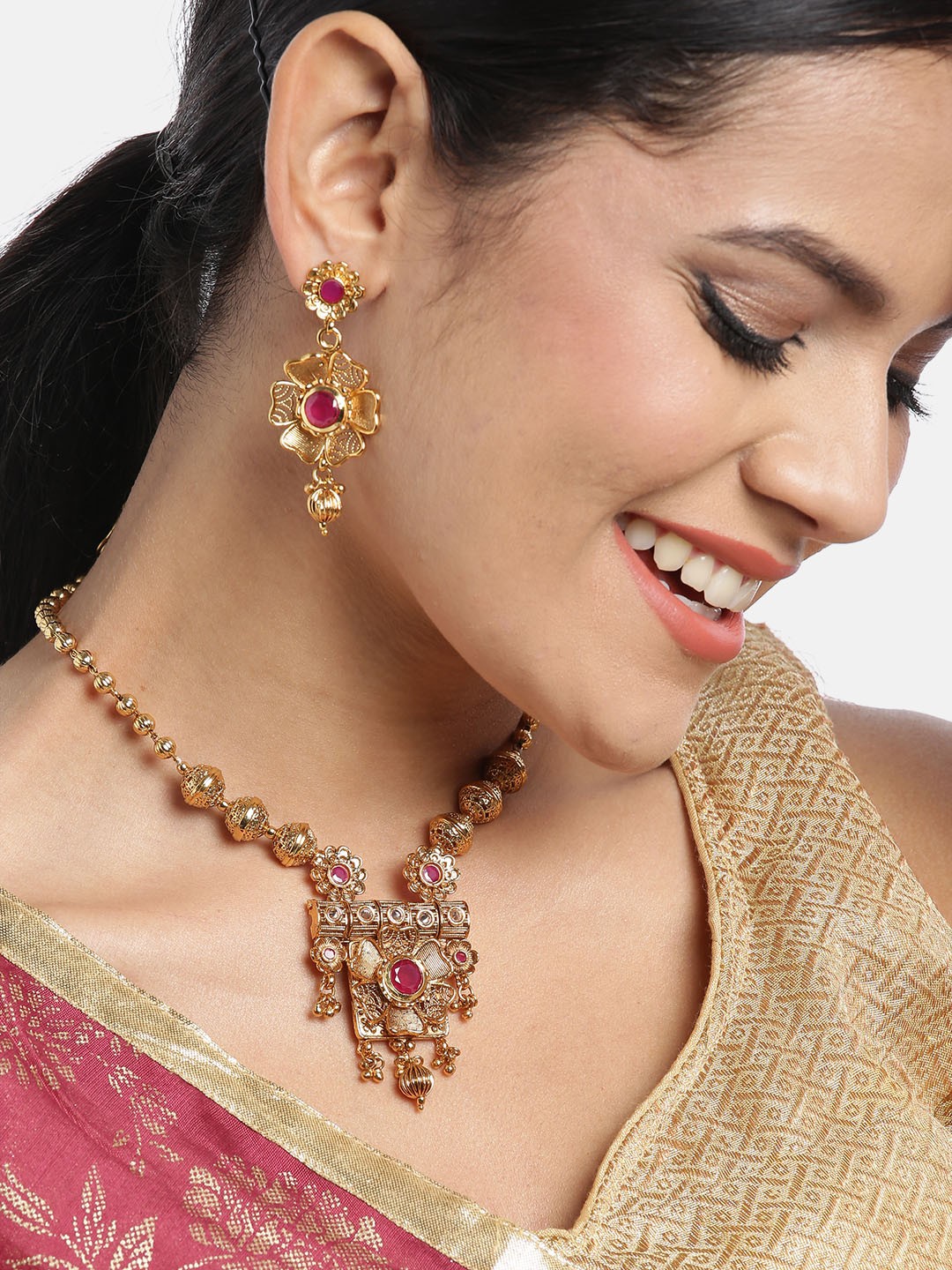 

JEWELS GEHNA Pink Gold-Plated Stone Studded Handcrafted Jewellery Set