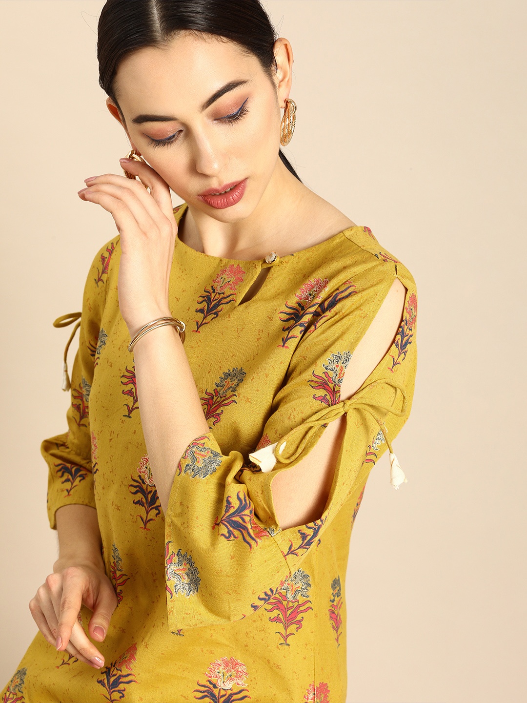 

Anouk Women Mustard Yellow Floral Printed Kurta with Palazzos