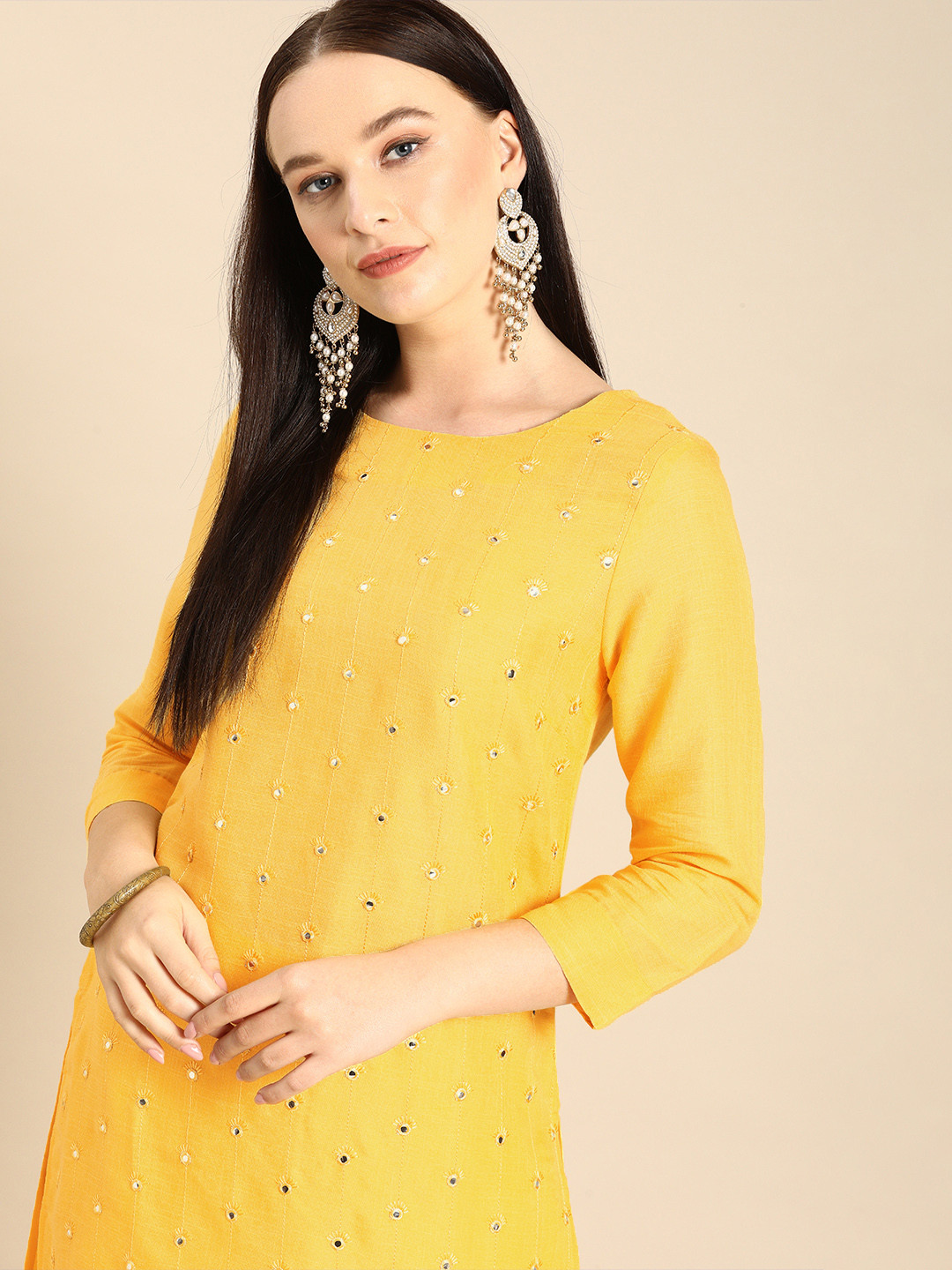 

Anouk Women Yellow Embroidered Mirror Work Kurta with Palazzos