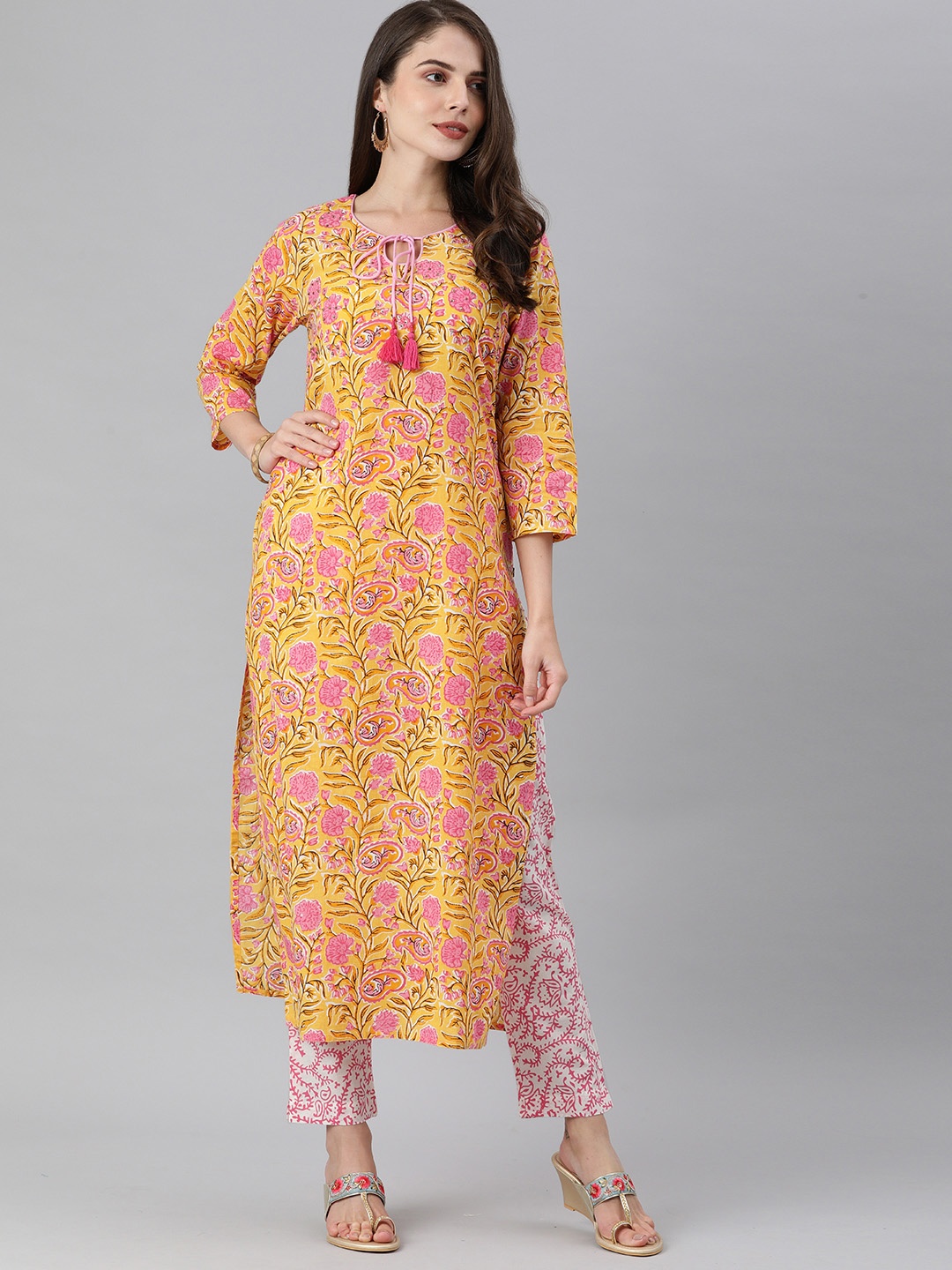 

KSUT Women Yellow & Pink Printed Kurta with Trousers