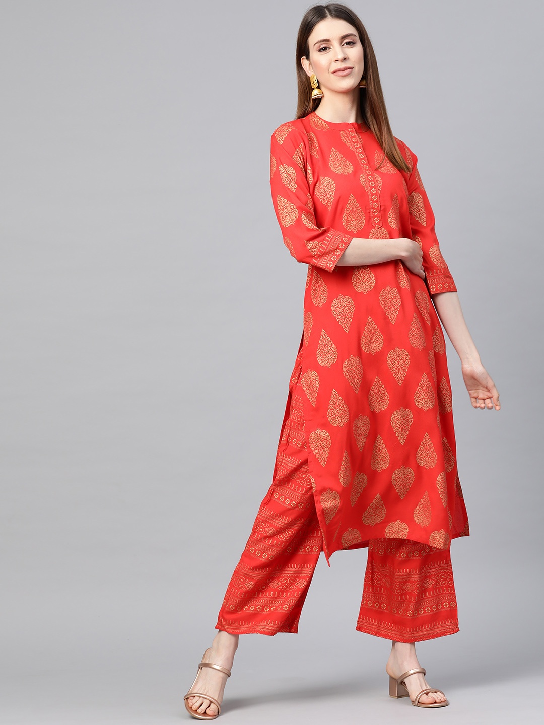 

Yuris Women Orange & Golden Foil Printed Kurta with Palazzos