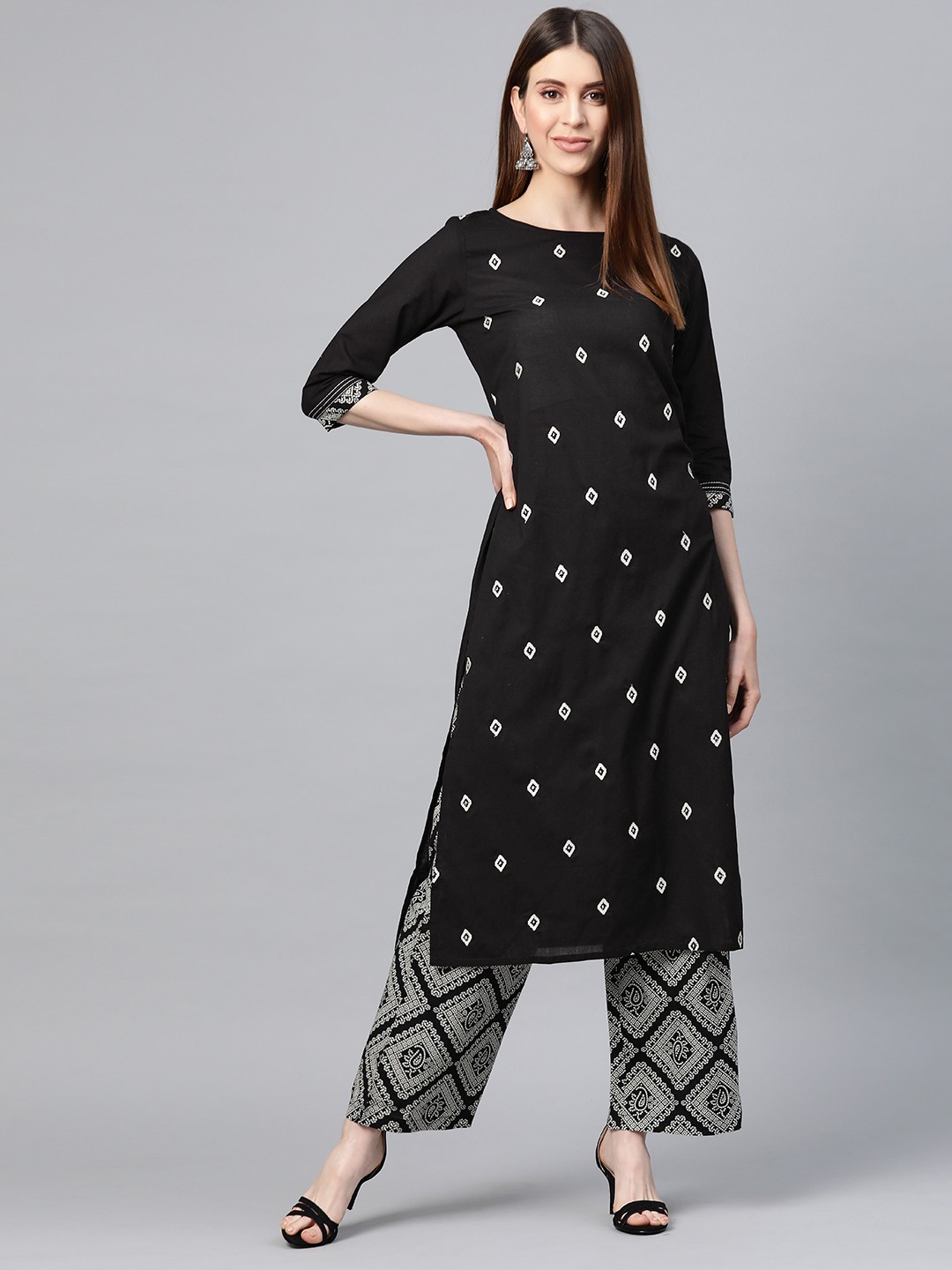 

Yuris Women Black & White Pure Cotton Embroidered Kurta with Palazzos