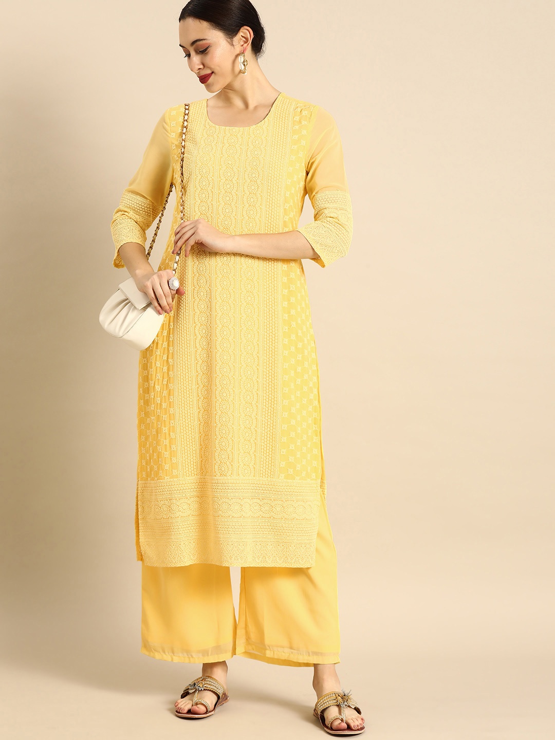 

Anouk Women Yellow Chikankari Embroidered Kurta with Palazzos