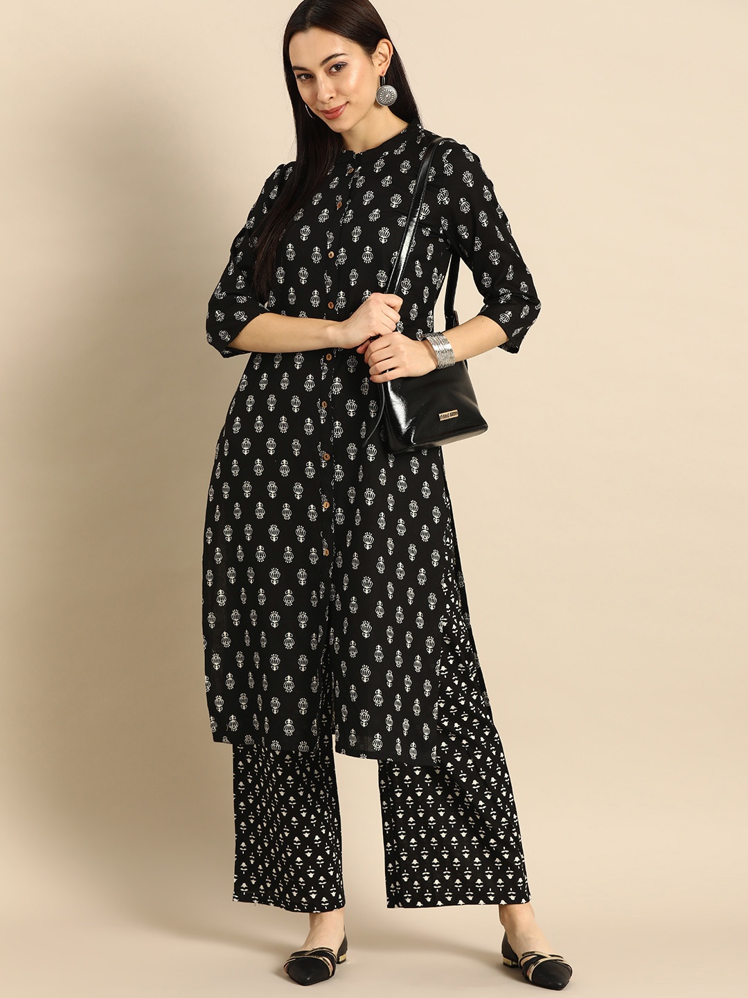 

Anouk Women Black Printed Kurta with Palazzos