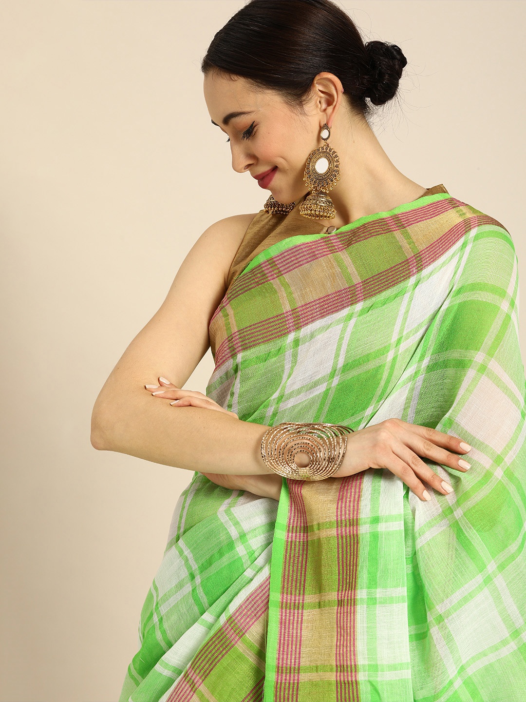 

Anouk Green & White Cotton Blend Checked Saree