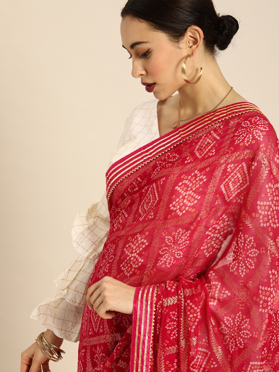 

Anouk Red & White Pure Georgette Printed Bandhani Saree