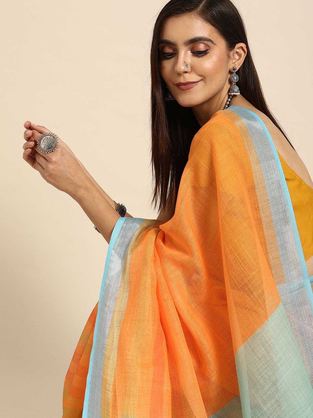 

Anouk Orange & Blue Striped Bhagalpuri Saree