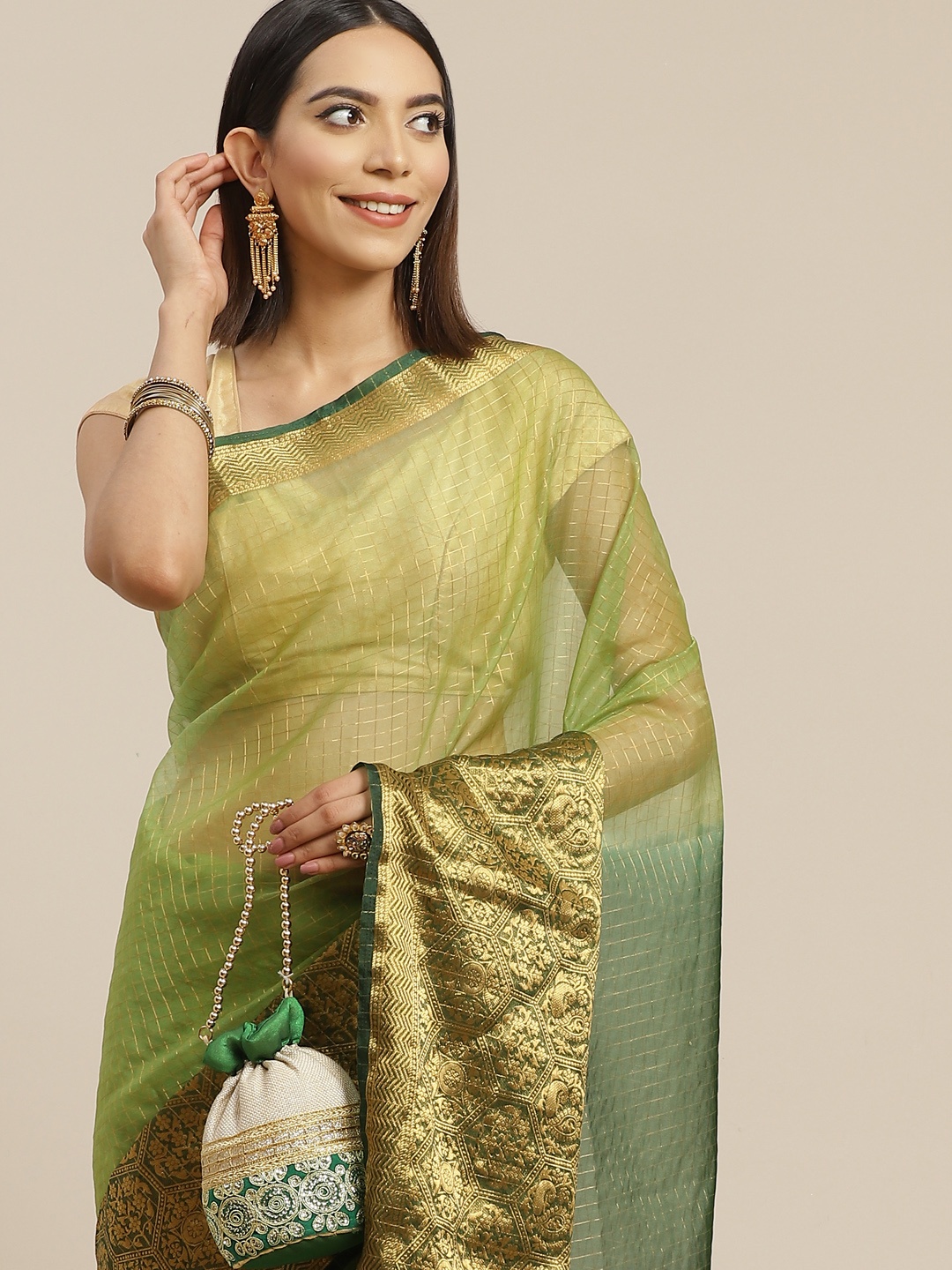 

Anouk Green & Golden Woven Design Checked Organza Mysore Silk Saree