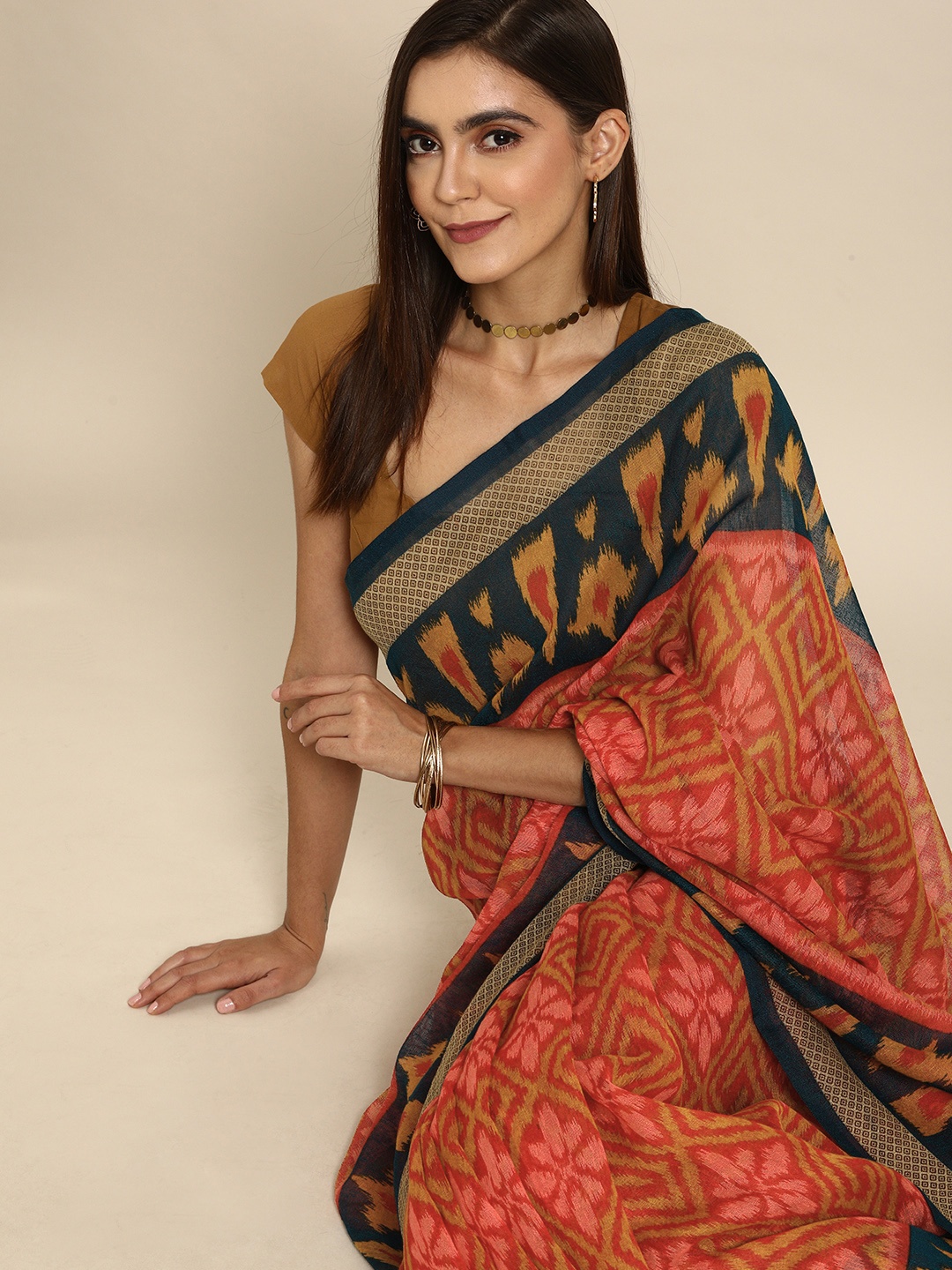 

Anouk Maroon & Mustard Yellow Jute Silk Printed Ikat Saree