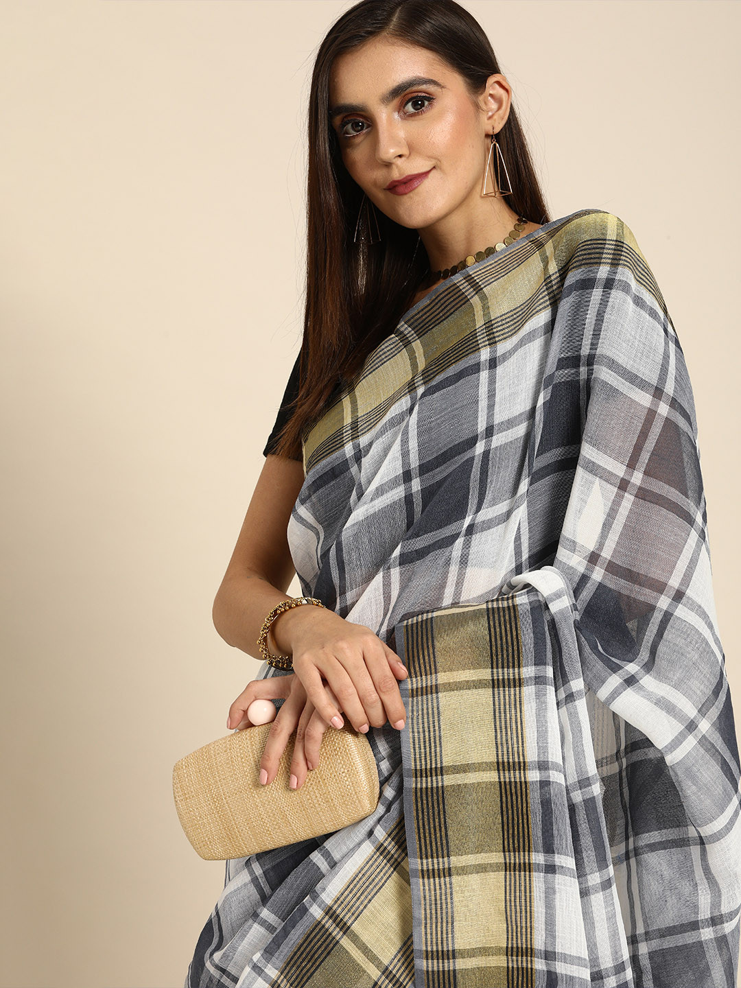 

Anouk Black & White Cotton Blend Checked Saree