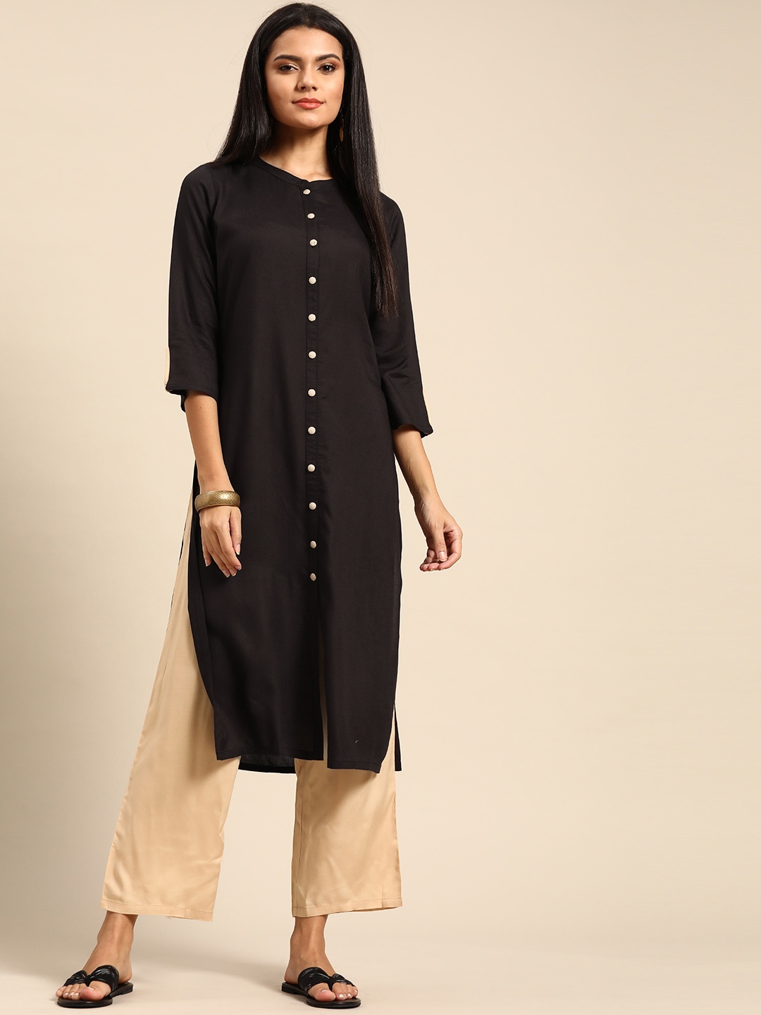 

Anouk Women Black & Beige Solid Kurta with Palazzos