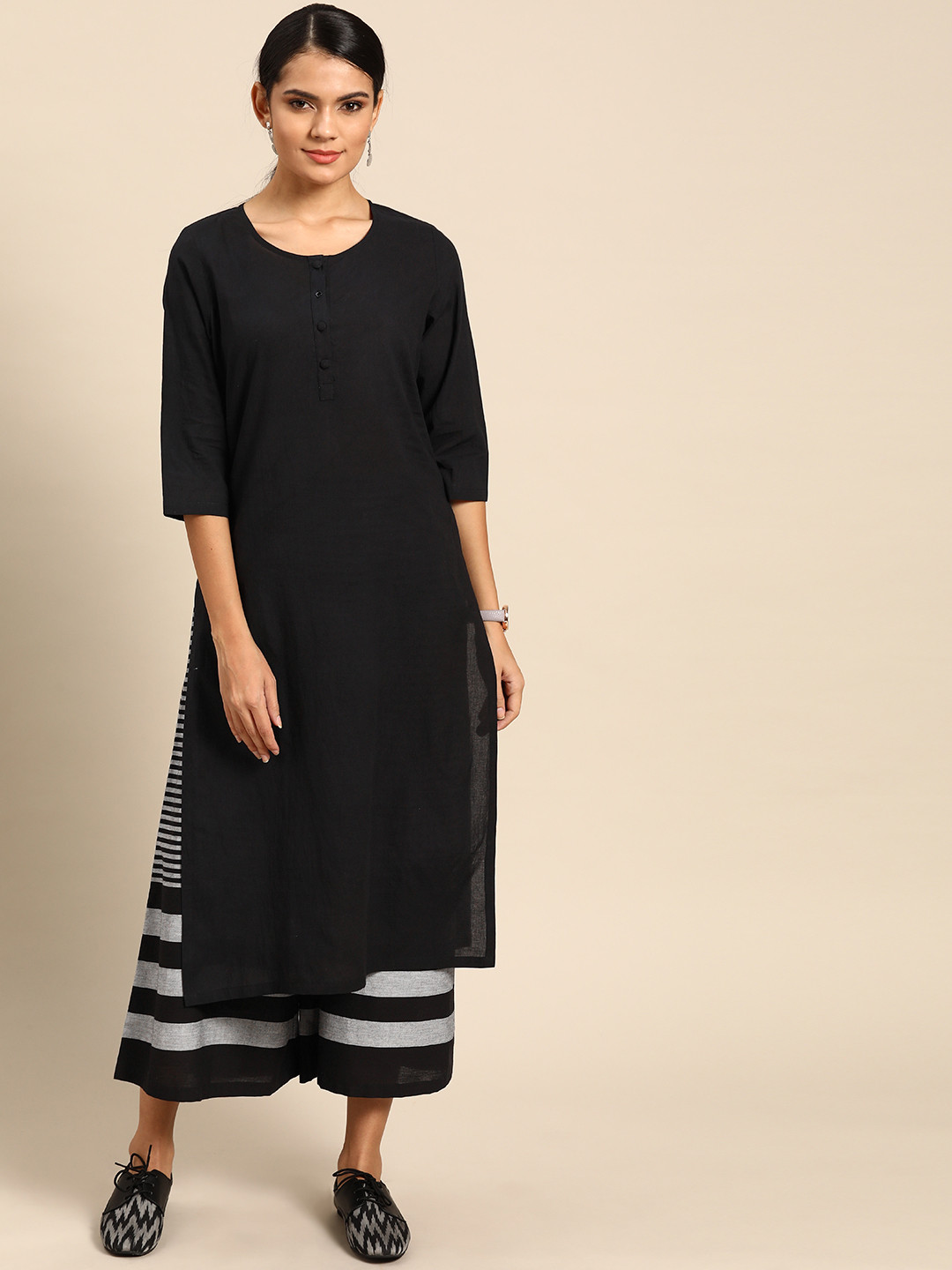 

Anouk Women Black Solid Pure Cotton Kurta with Palazzos