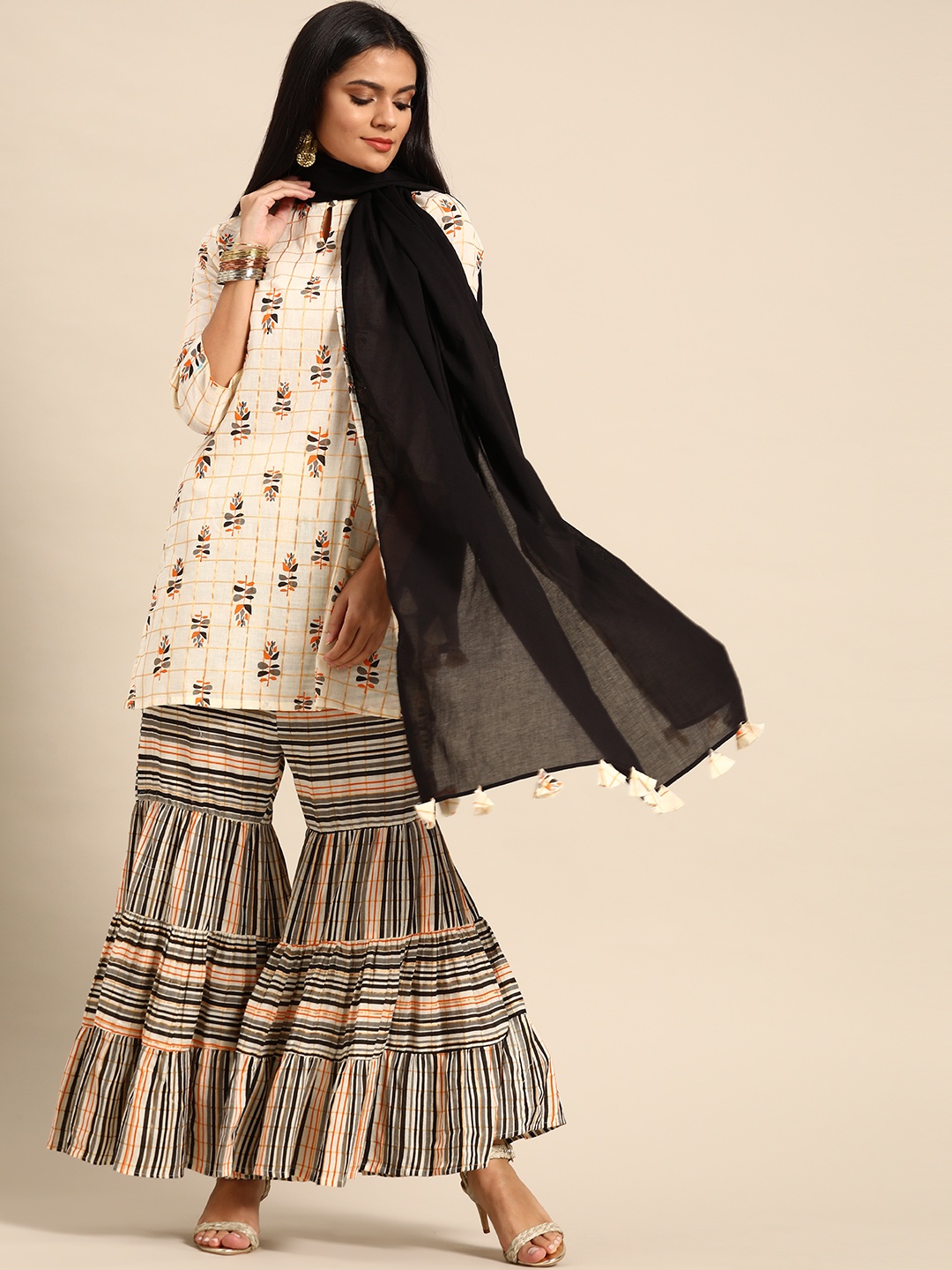 

Anouk Women Off-White & Black Printed Kurti with Sharara & Dupatta