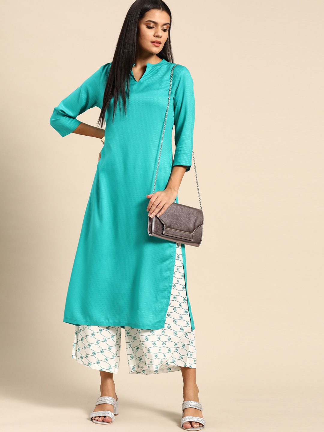 

Anouk Women Turquoise Blue & White Woven Design Kurta with Palazzos