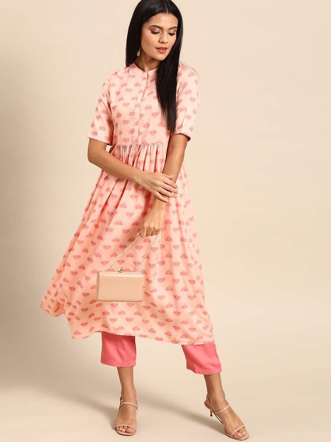 

Anouk Women Pink & Golden Foil Printed Kurta with Trousers