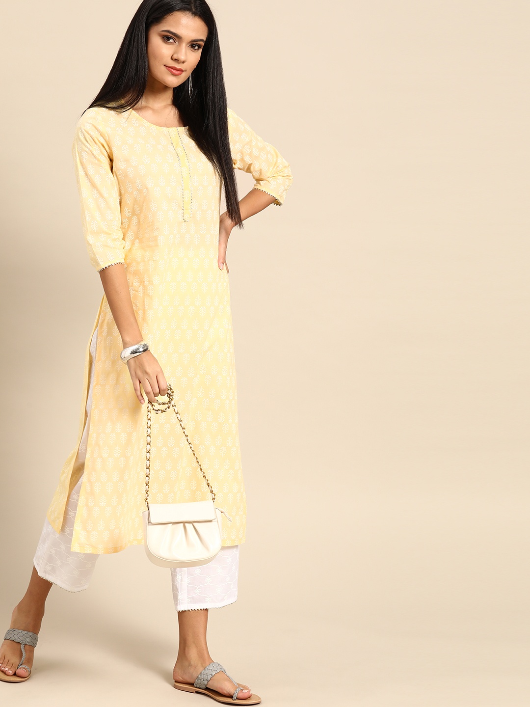 

Anouk Women Yellow & White Printed Pure Cotton Kurta with Palazzos