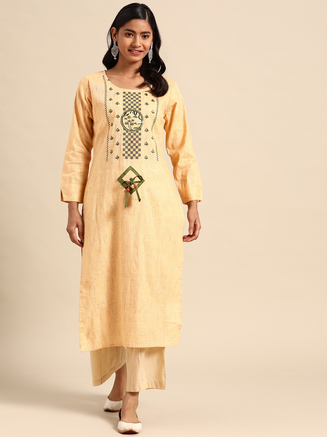 

Rajnandini Women Yellow & Green Ethnic Motifs Embroidered Cambric Cotton Sequins Kurta