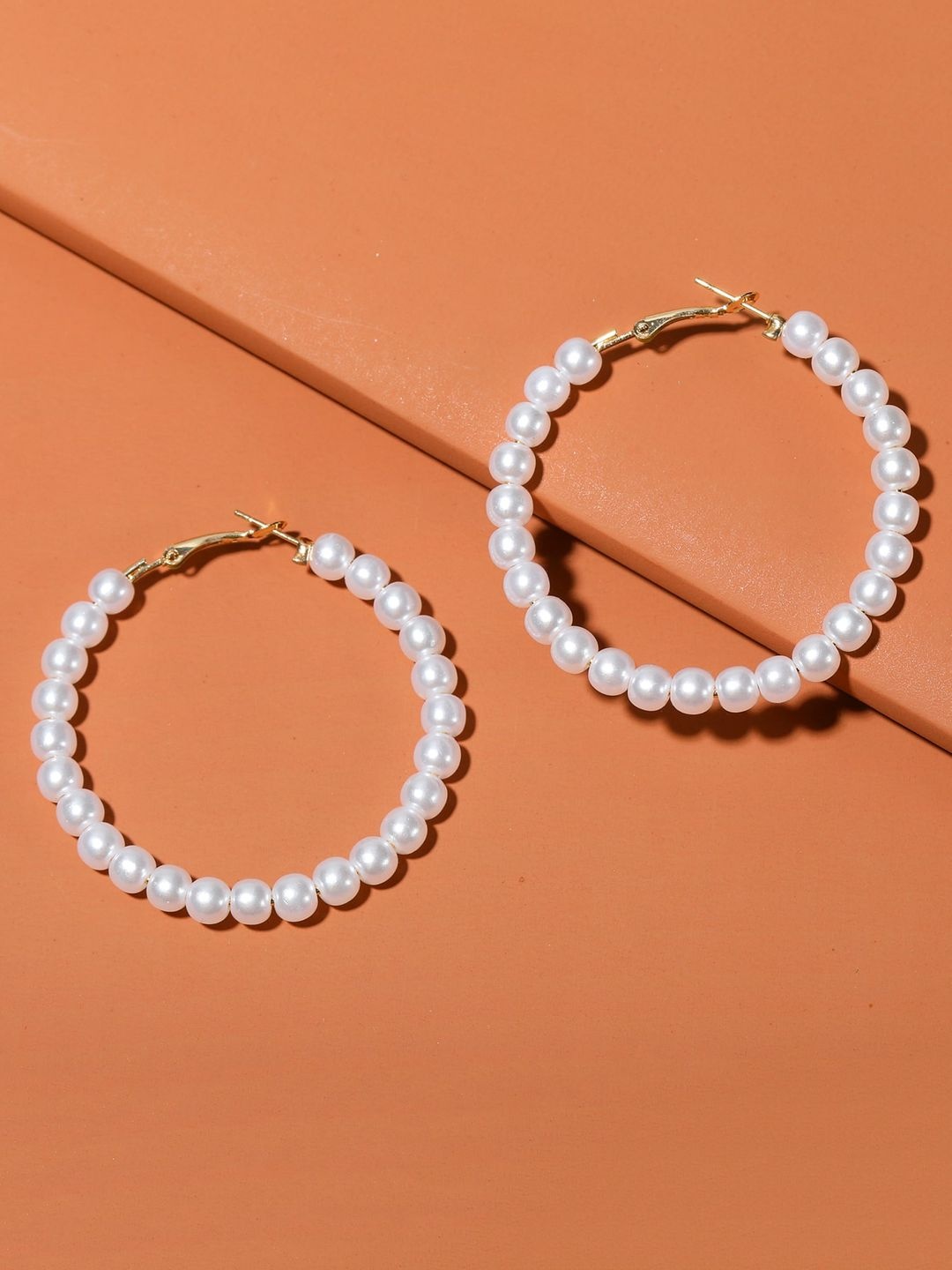 

OOMPH White Circular Hoop Earrings