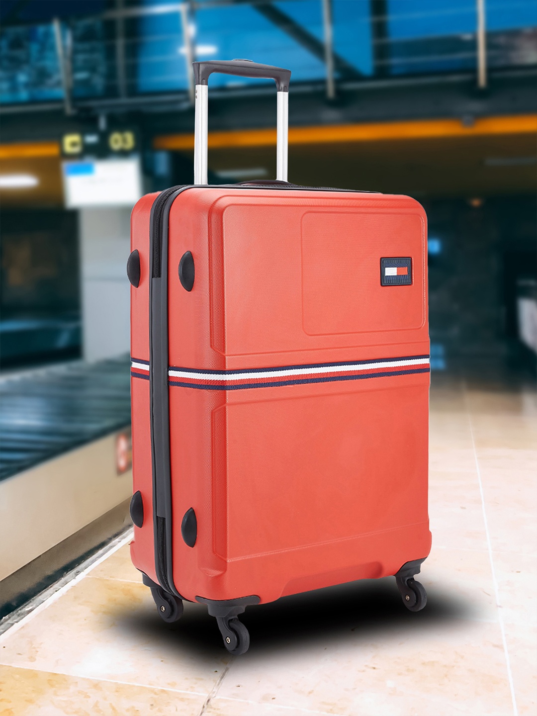 

Tommy Hilfiger Solid 360 Degree Rotation 4 Wheels Medium Hard Trolley Suitcase, Red