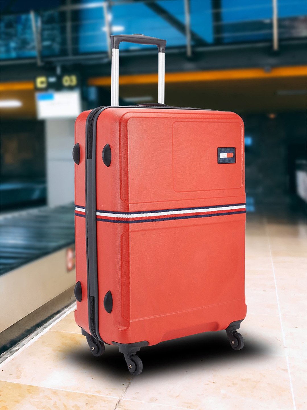 

Tommy Hilfiger Solid Hard 4 Wheels 360-Degree Rotation Medium Trolley Bag, Red