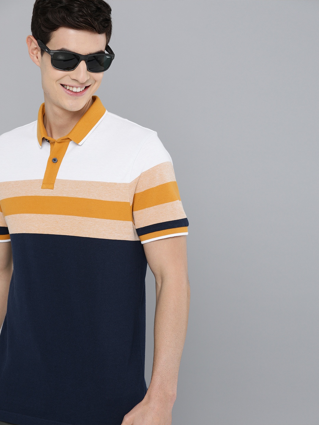 

Mast & Harbour Men Navy Blue & Mustard Yellow Colourblocked Polo Collar T-shirt