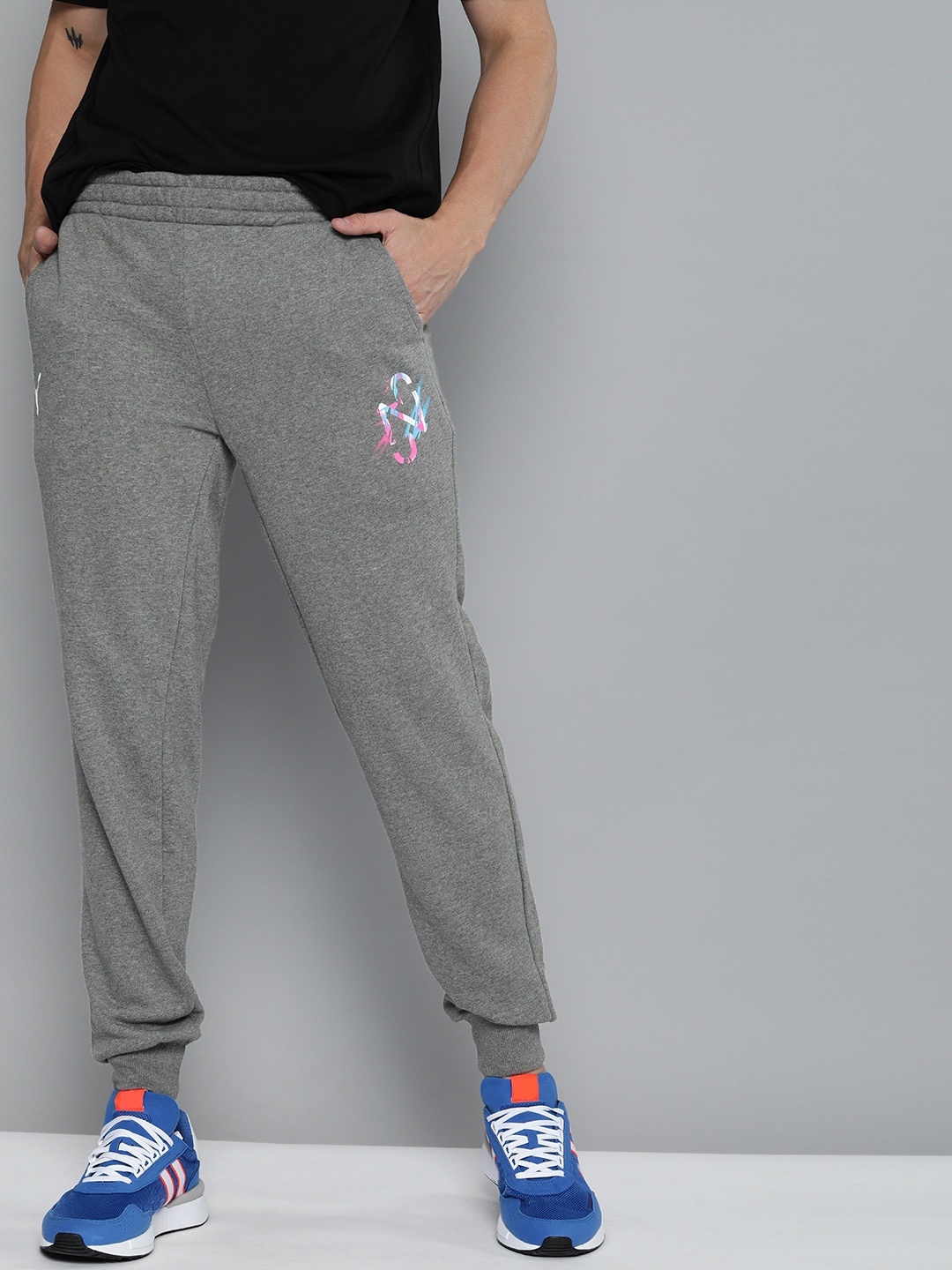 

Puma Men's Grey Melange Solid Track Pants