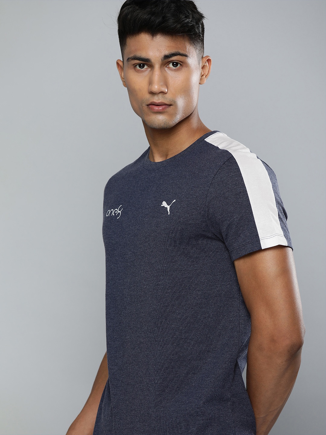 

one8 x PUMA Men Navy Blue Solid Slim Fit VK Core Heather Panel Round Neck T-shirt