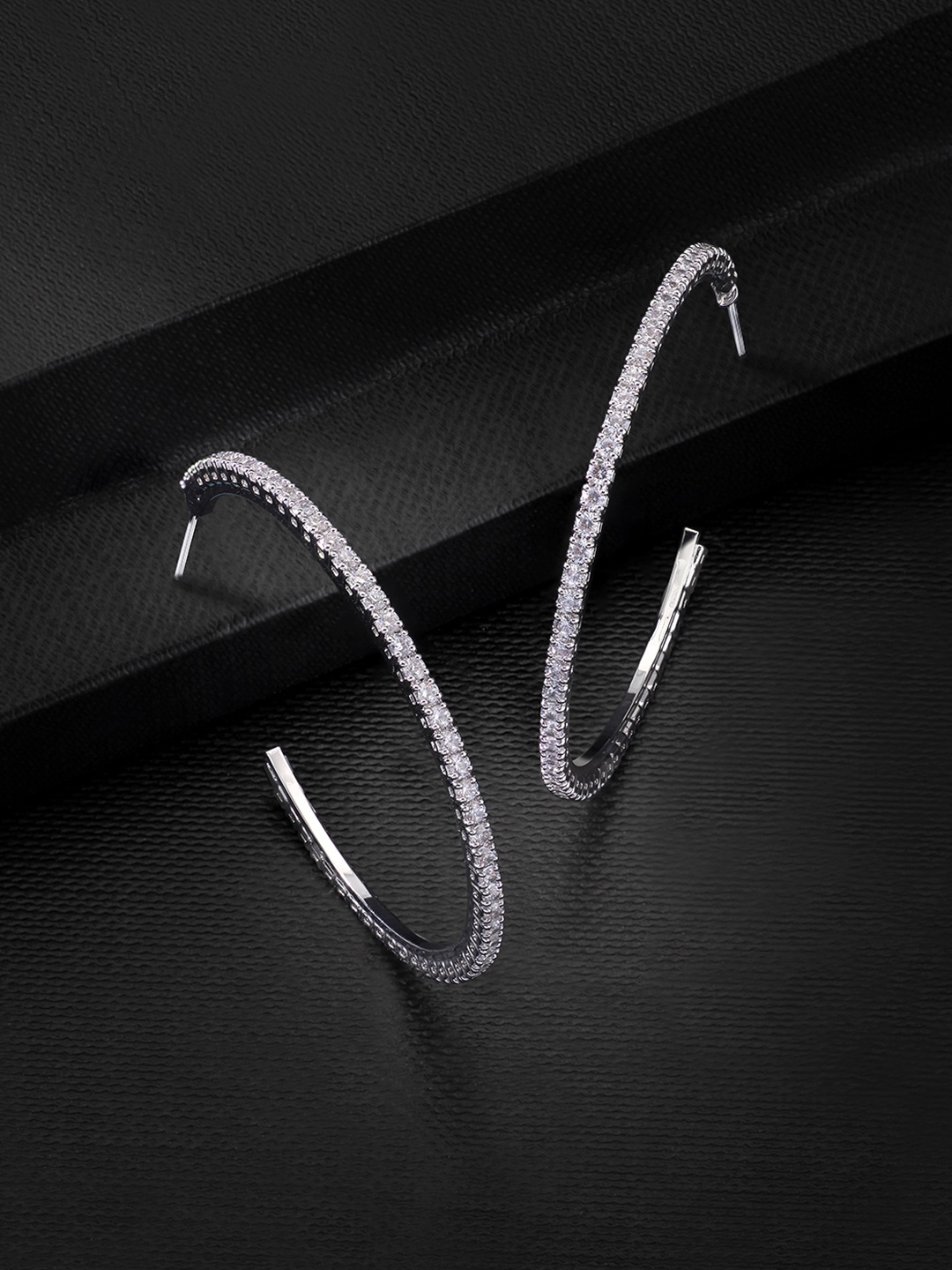 

Peora White Silver Plated CZ Studded Circular Half Hoop Earrings