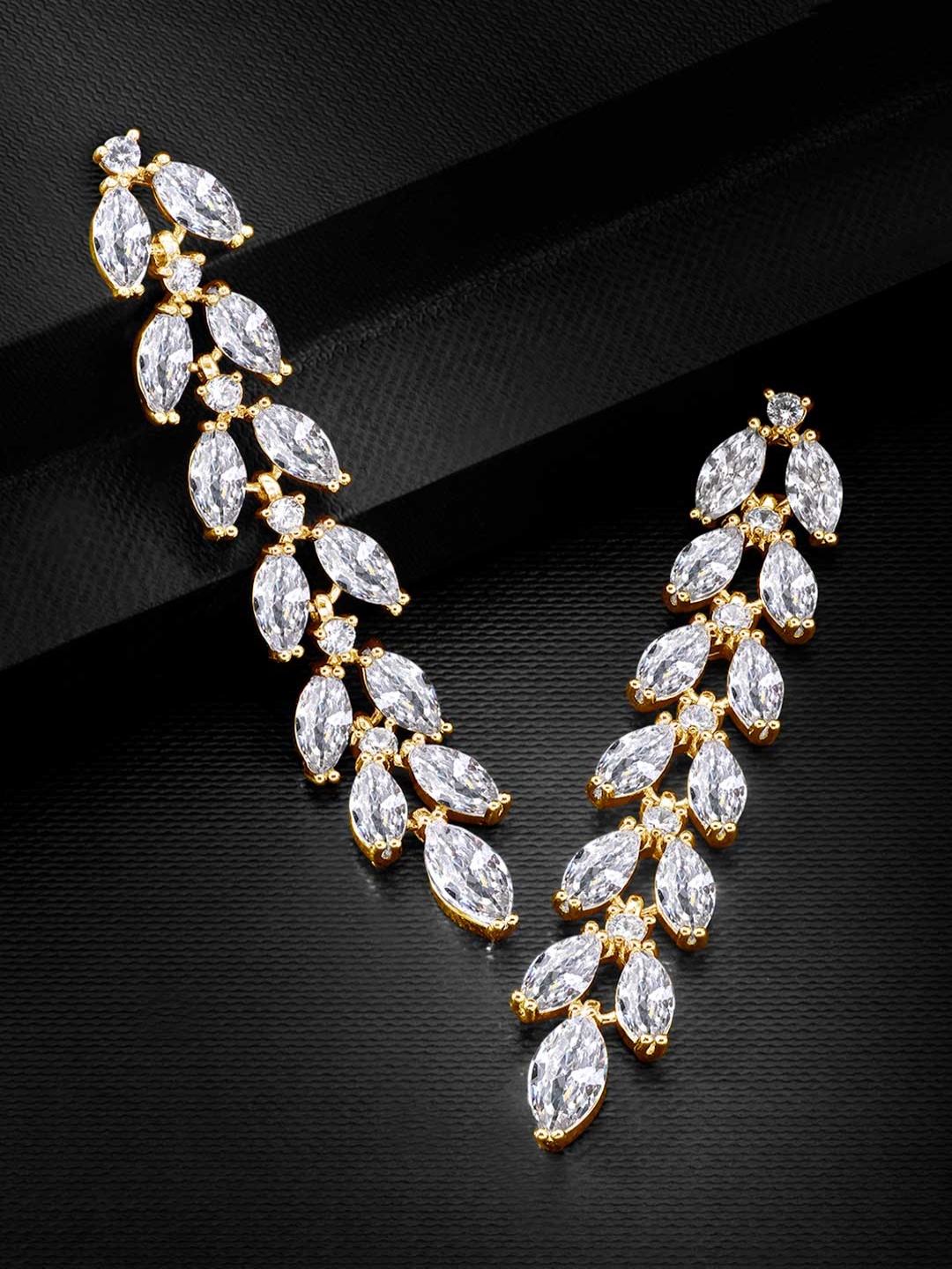 

Peora Gold Plated & White Leaf Shaped Cubic Zirconia Studded Drop Earrings