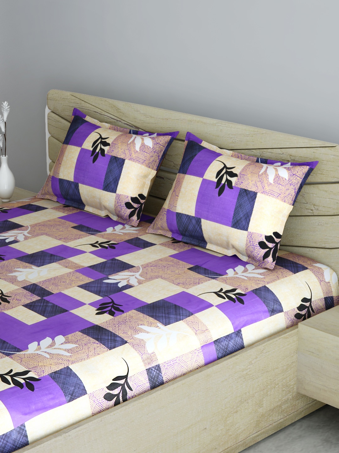 

Aura Purple & Beige Leaf Printed 144 TC Cotton 1 Queen Bedsheet with 2 Pillow Covers