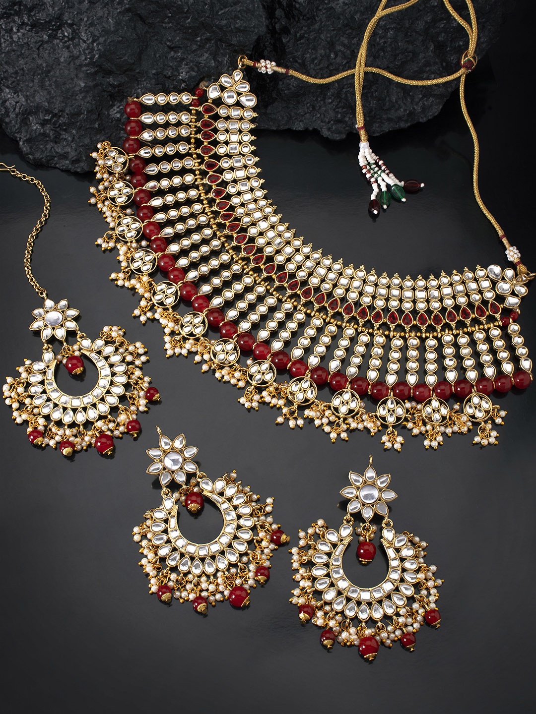 

Peora Gold Plated Kundan Maroon Jewellery Set