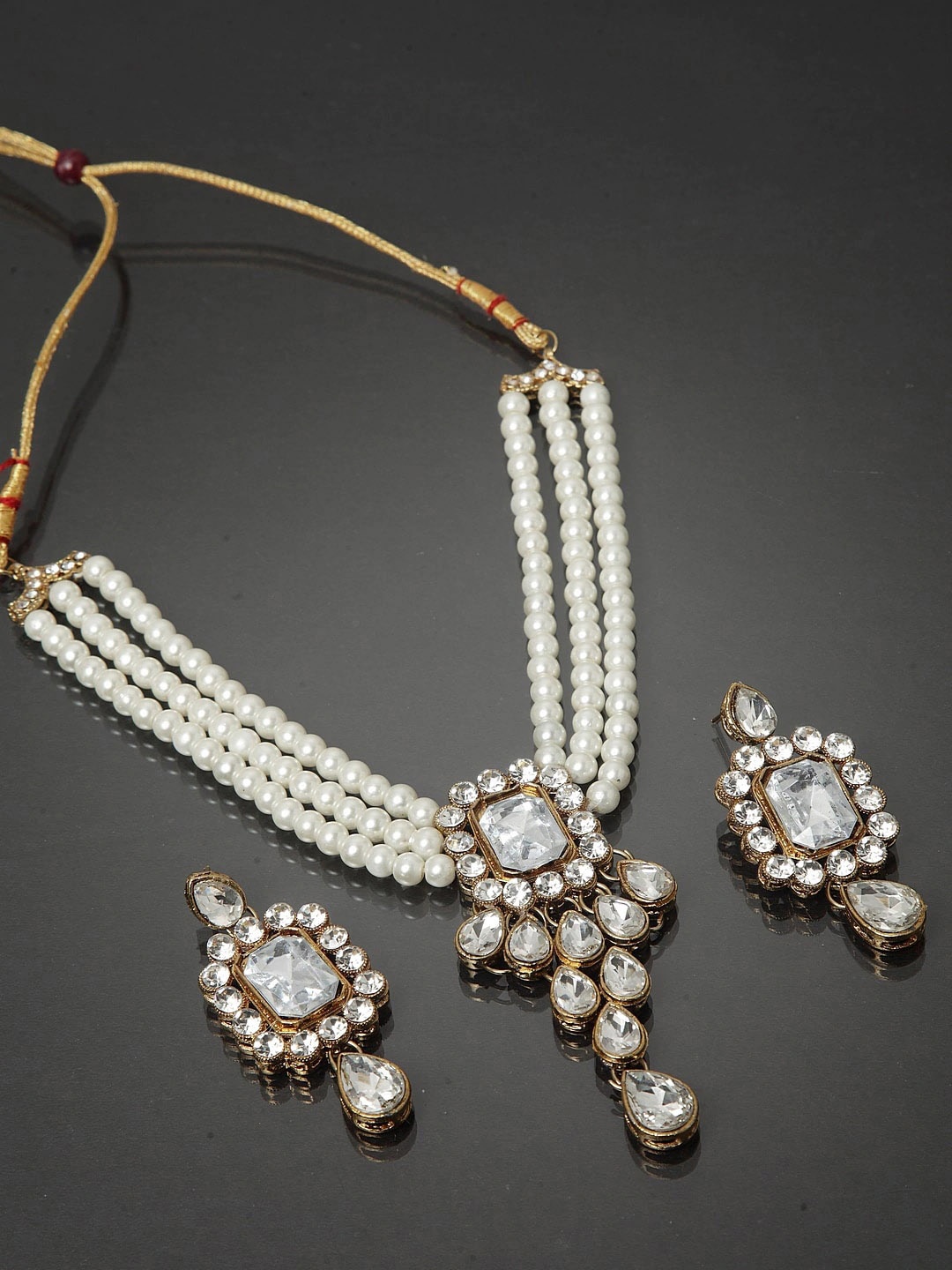 

Peora White Crystal Pearl Gold Plated Jadau Jewellery Set