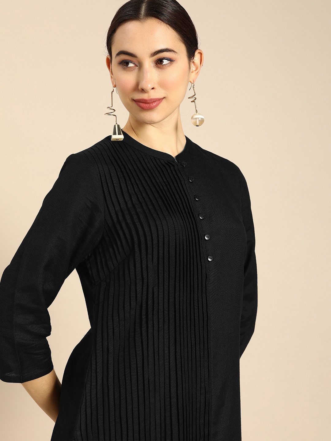 

Anouk Women Black Solid Pleated Kurta