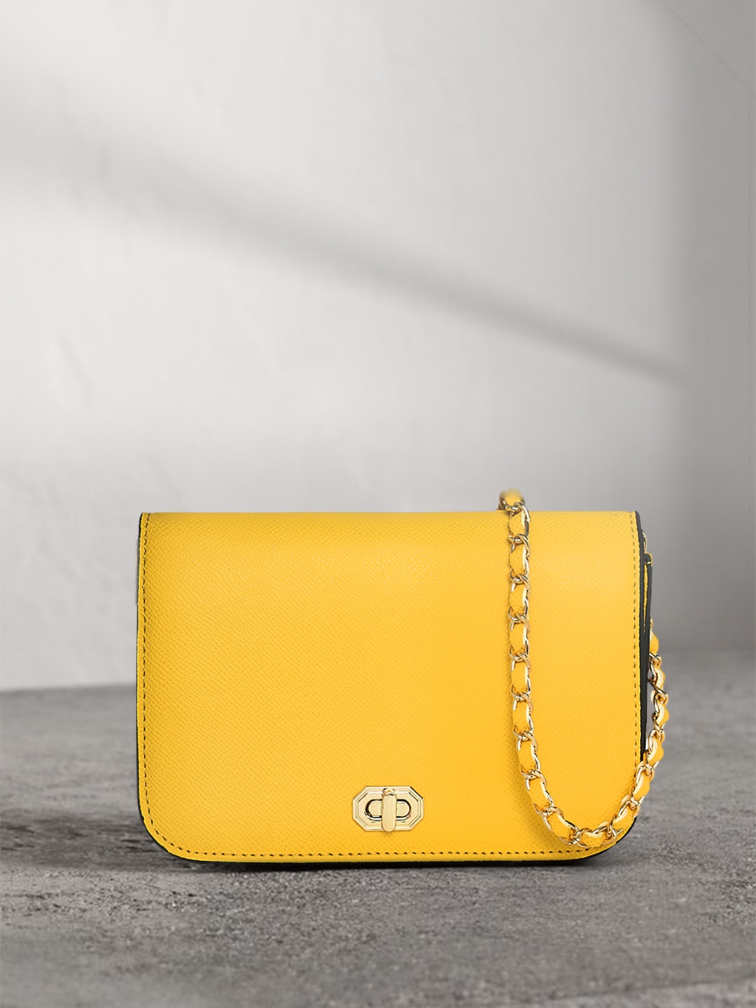 

Accessorize London Women Faux Leather Woven Chain Evie Sling Bag, Yellow