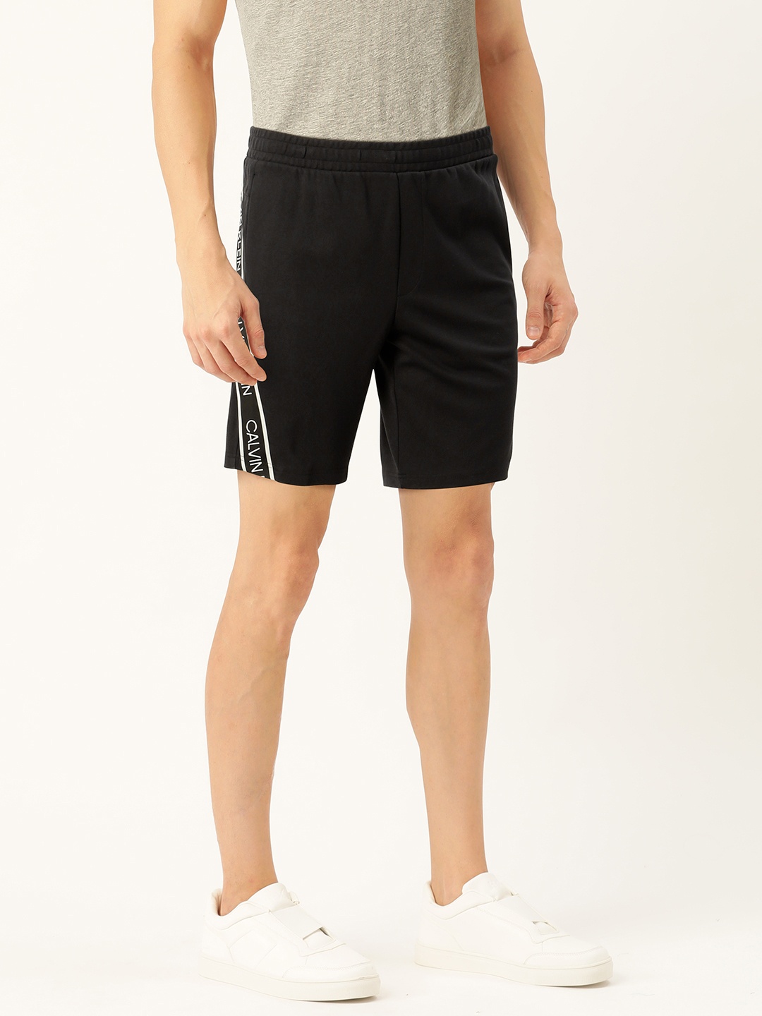 

Calvin Klein Jeans Men Black Solid Regular Fit Regular Shorts