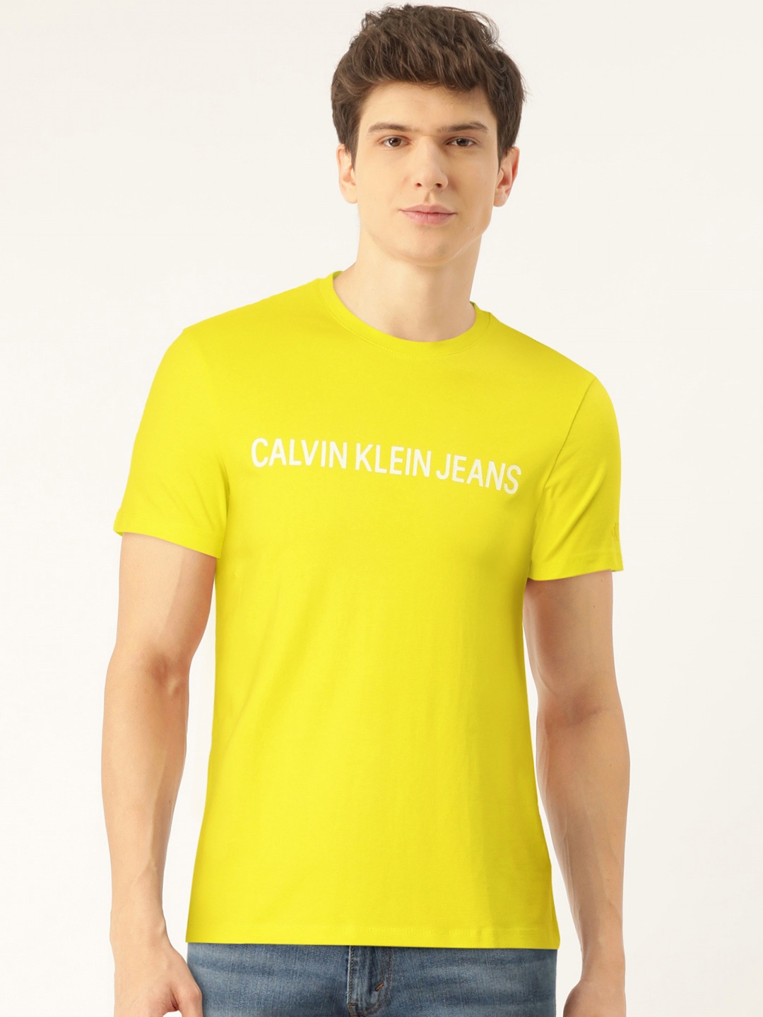 

Calvin Klein Jeans Men Yellow Solid Slim Fit Round Neck T-shirt