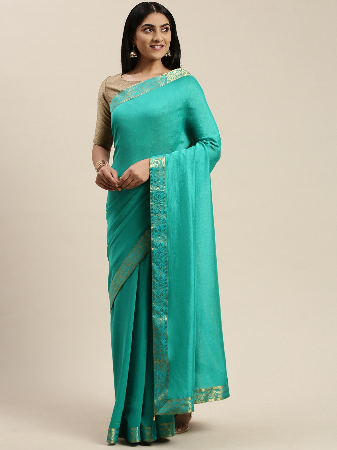 

Indian Women Turquoise Blue Solid Silk Blend Saree