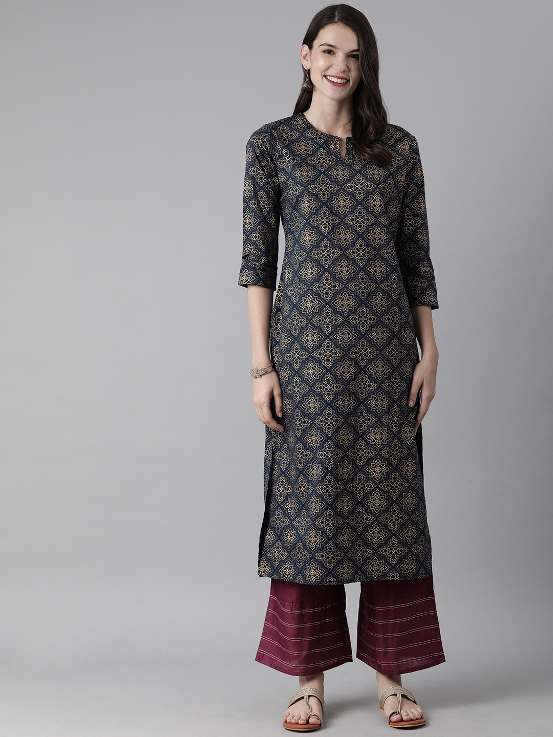 

Indo Era Women Navy Blue & Mustard Ethnic Motifs Printed Kurta