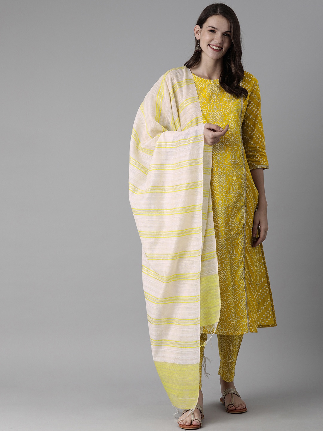 

Indo Era Women Yellow & White Printed Kurta with Palazzos & Dupatta