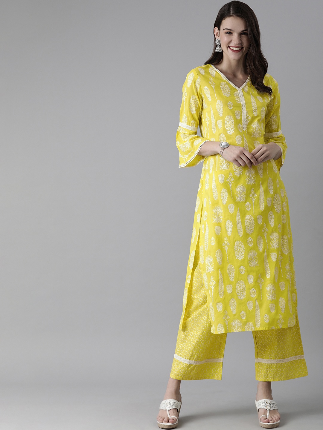

Indo Era Women Yellow & White Embroidered Kurta with Palazzos with Lace Inserts