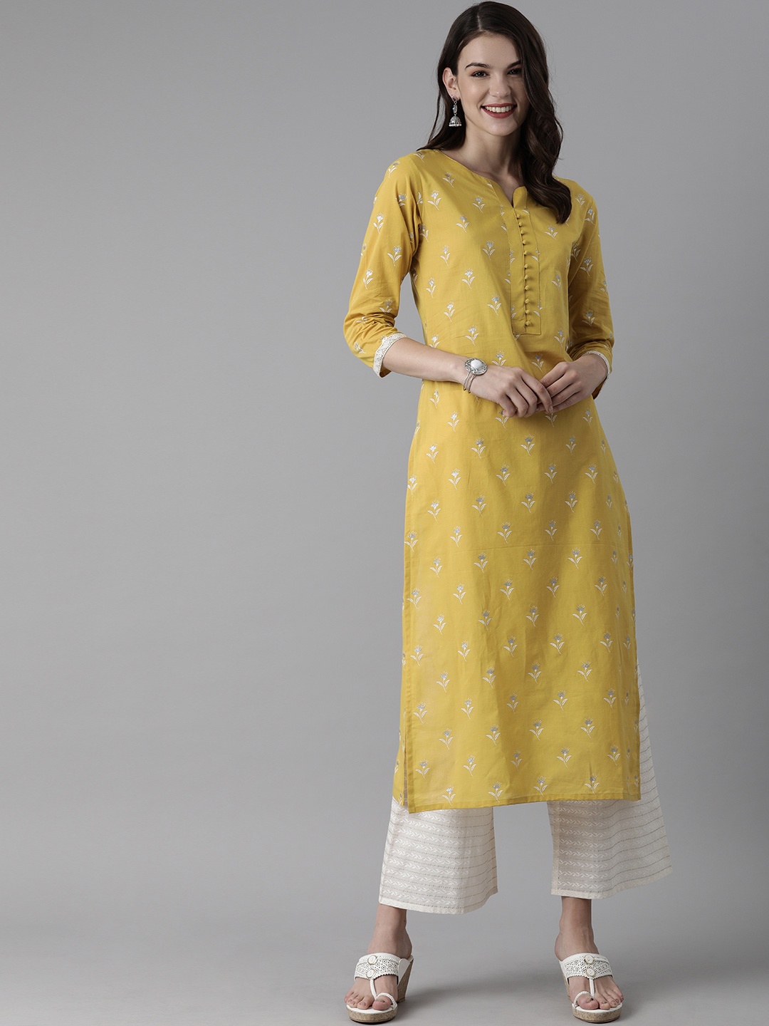 

Indo Era Women Green & White Printed Kurta with Palazzos