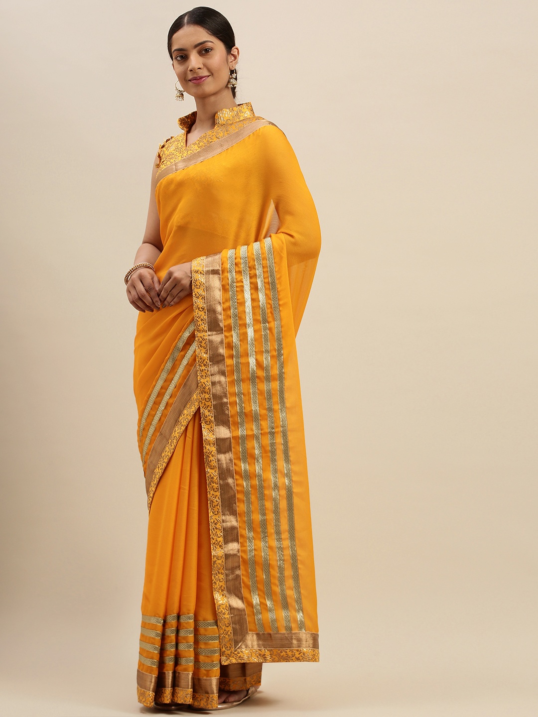 

Mitera Yellow & Gold-Toned Solid Saree