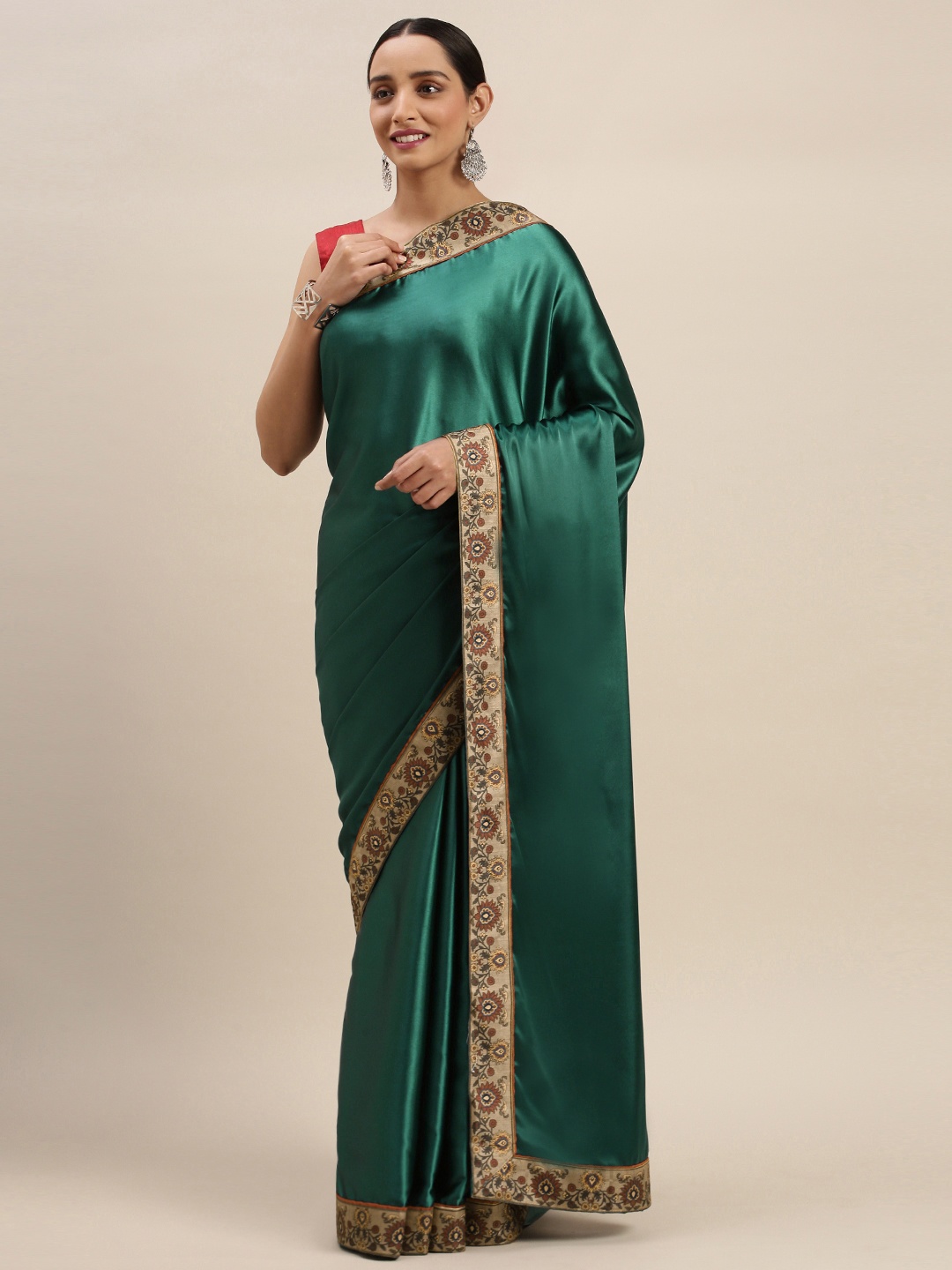 

Mitera Teal Green Solid Pure Crepe Saree