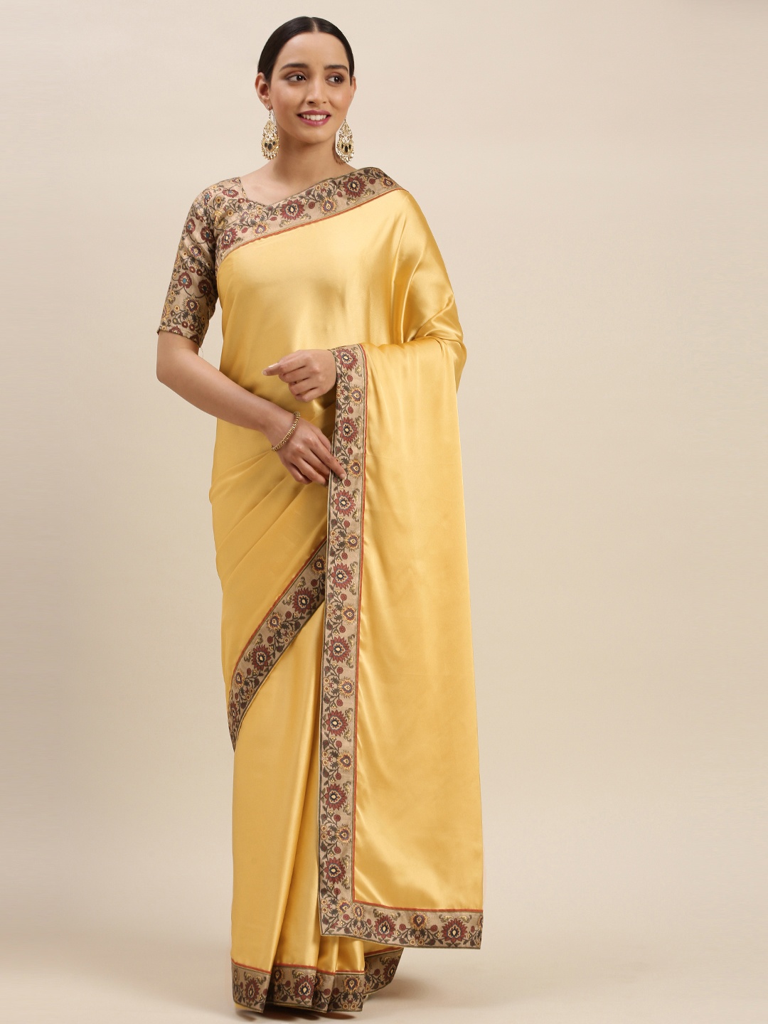 

Mitera Yellow Solid Pure Crepe Saree