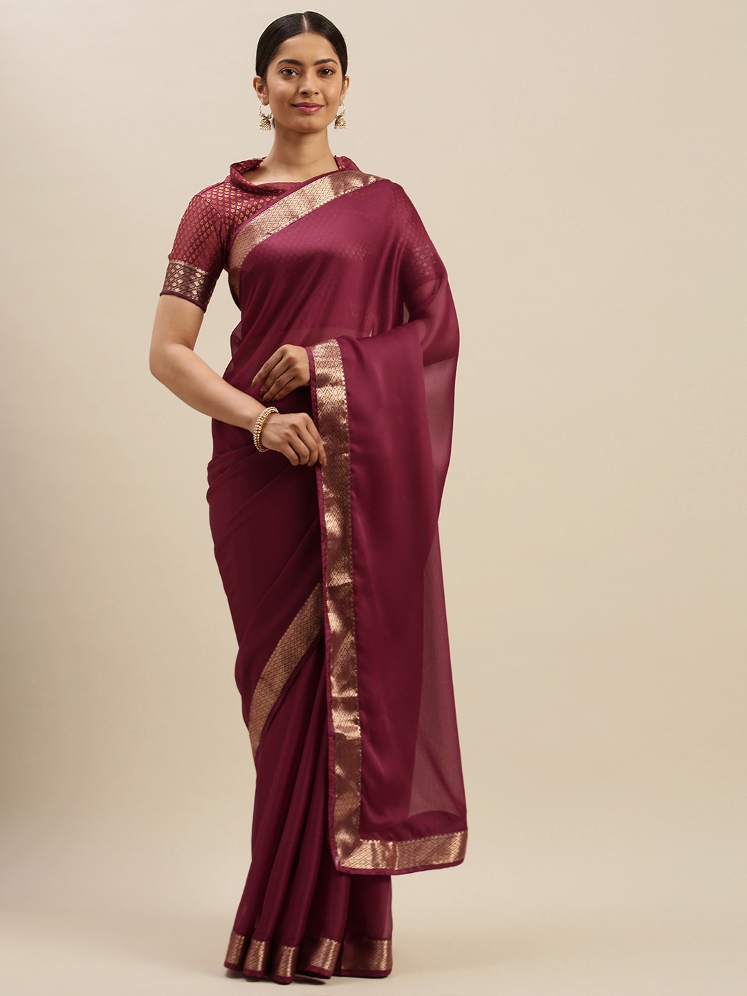 

Mitera Maroon Solid Poly Chiffon Saree